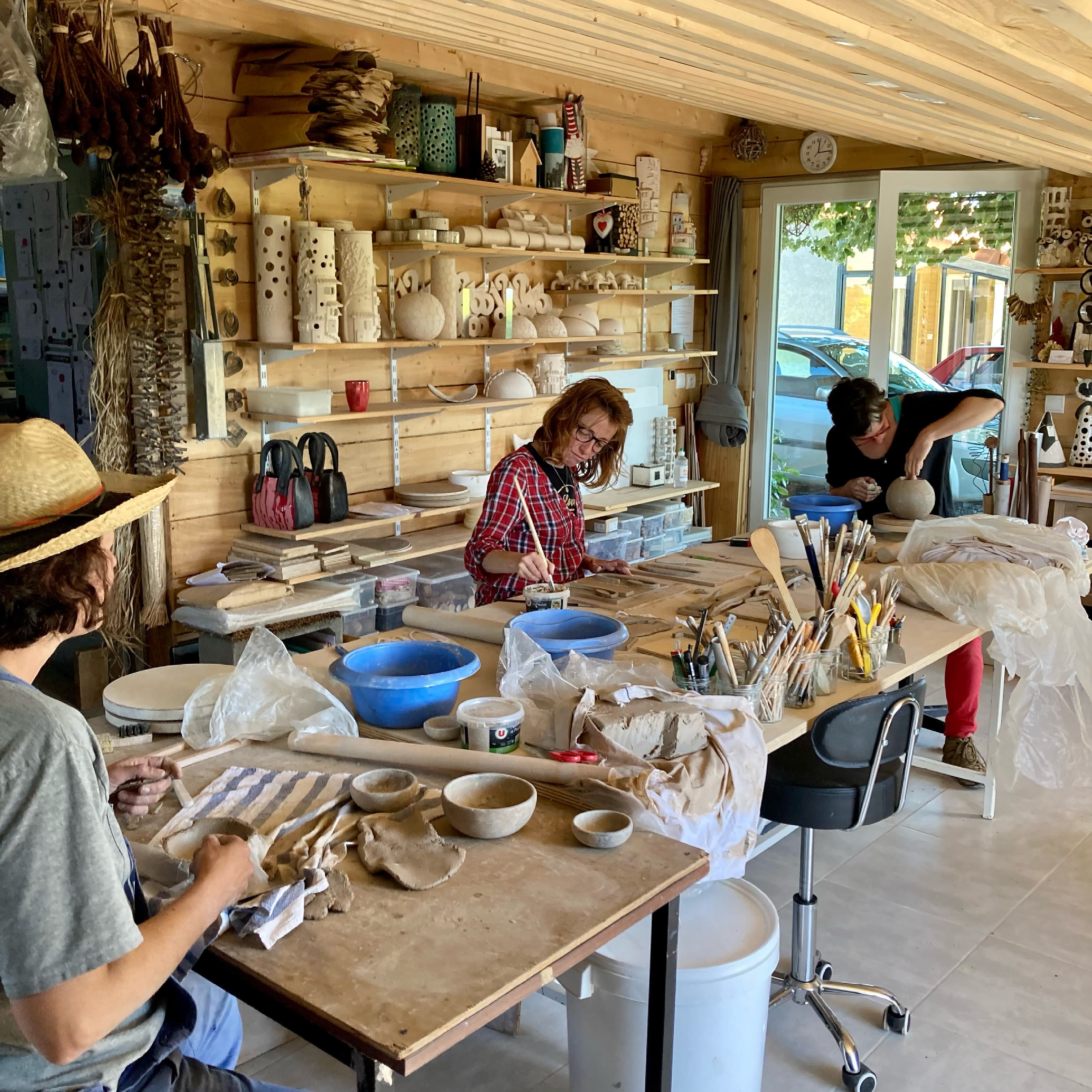 Hand-building pieces in the studio